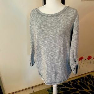 Light grey long sleeve shirt crew neck with buttons to make it 3/4 sleeve